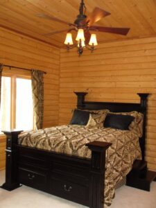 Whispering Pines projects log interior main bedroom